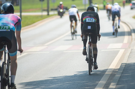 A cyclist rides a bicycle on a bicycle path. Sports and recreation.