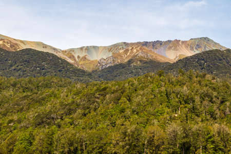 South Island landscapes on the way to Milford Sound. Forest and picturesque rocks. Fiordland National Park. New Zealandの写真素材
