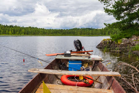 Fishing boat at the shore of the lake. Lake Tagasuk. Krasnoyarsk Territory, Russiaの写真素材