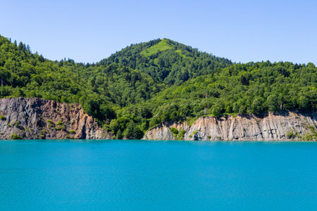 Beautiful landscape of mountain lake with turquoise water and green forest. Blue Lakes. Sakhalin, Russiaの写真素材