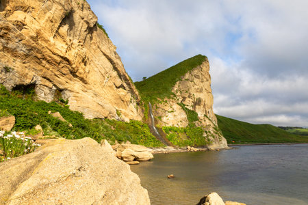 Yellowish cliffs above the sea in the south of Sakhalin. Russiaの写真素材