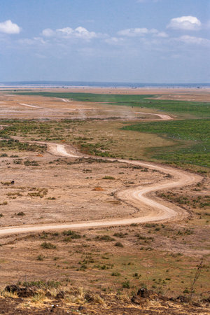 A view of the plains and waters from a low hill. Kenya, Africaの写真素材