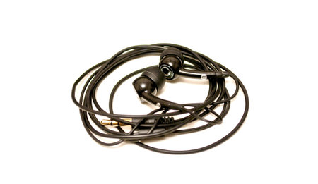 Micro headphones on white background