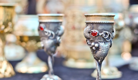 vintage metal goblet with a red gemの写真素材