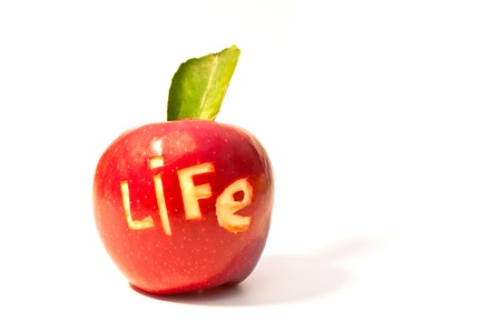 word of life cut out on a red appleの写真素材