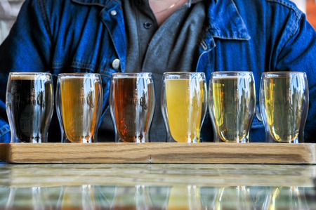 glasses of the different Beers on wood deskの写真素材