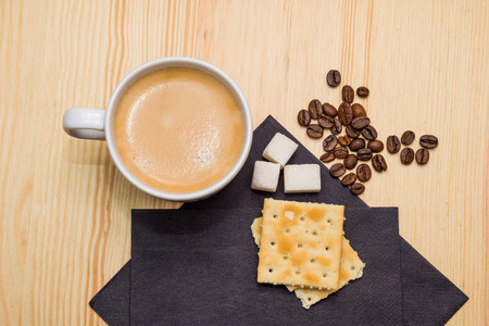 still life: cookies and coffee on wooden tableの写真素材