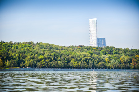 urban landscape: river, park and skyscraperの写真素材