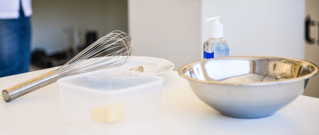 whisk and metal bowl