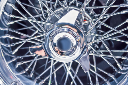 central screw nut on classic car wire wheelの写真素材