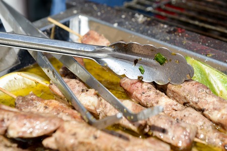 the Juicy roasted kebabs on the metal trayの写真素材