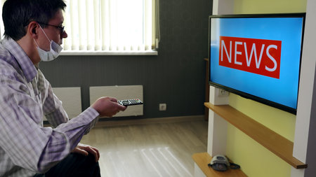 Person stays at home and waits for what news will be broadcast on television in connection with the...