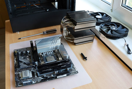 St. Petersburg, Russia - July 17, 2021: Assembling new modern computer, details for installation are on tableのeditorial素材