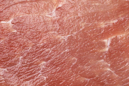 Abstract texture background, red pork meat with streaks, close-upの写真素材