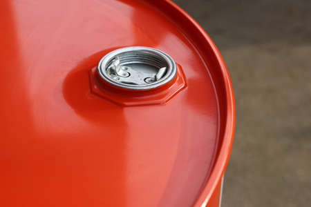 Close-up, cap closed in the iron red barrel of industryの写真素材