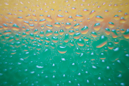 Colorful liquid droplets background wallpaperの写真素材