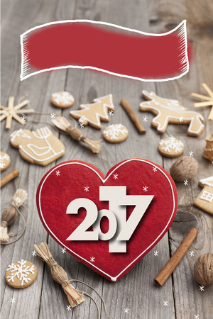 Christmas heart shaped gingerbread background. 2017 Winter holidays atmosphere. Snoflakes. Hand drawn ribbon for copy.Perfect for greeting cards, flyers, etc.Space for copyの写真素材