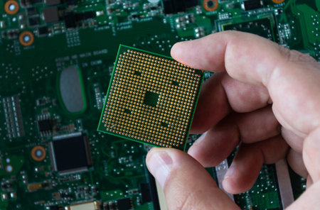 Computer processor chip on motherboard background