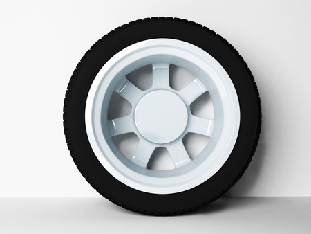 Classic automobile wheel on the white floor, renderingの写真素材