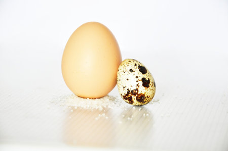 two eggs, standing on the salt
