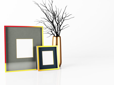 two frames and a vase with the brunches
