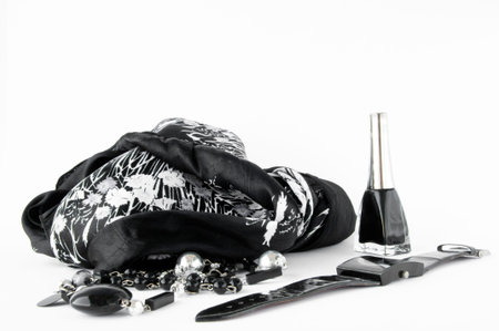 the necklace, watches and the nail near a handkerchiefの写真素材