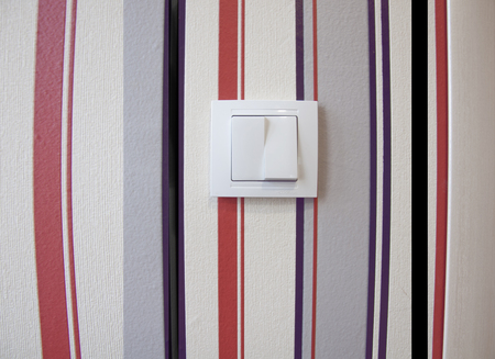 switch on a colored wallの写真素材
