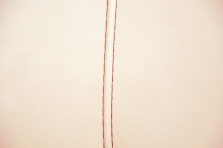 Beige genuine leather with a seam, textureの写真素材