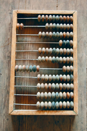 the wooden abacus on the floorの写真素材