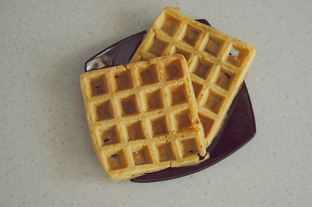 delicious waffles on a plate, top viewの写真素材