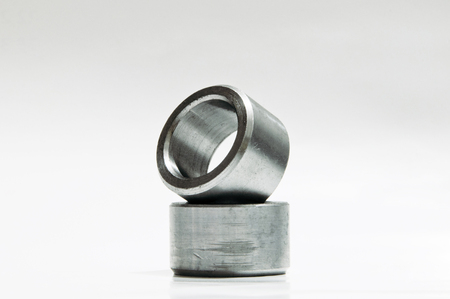 two metal rings on the tableの写真素材