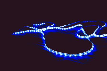 Christmas garland, LED ribbon on the tableの写真素材