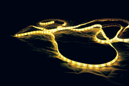 Christmas garland, LED ribbon on fabricの写真素材
