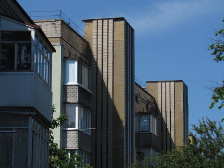 Multi-storey Soviet building in Ukraine, under the sunの写真素材