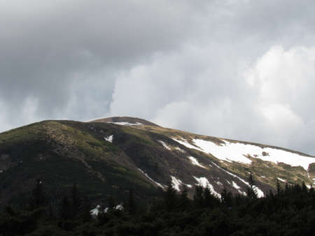 The highest mountain peak in Ukraine is Hoverla. View from the foothillsの写真素材