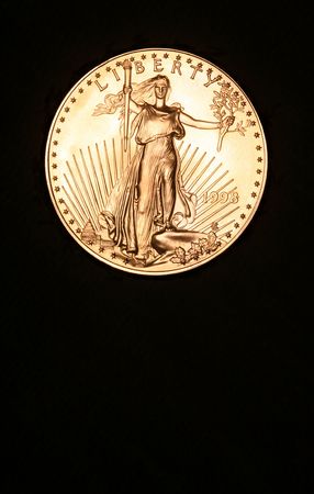 Golden Coin, American Eagle, Copy Space at Bottom.の写真素材