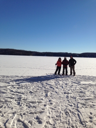 Snowshoeing on Lake Miskwabi in Ontario Canada の素材