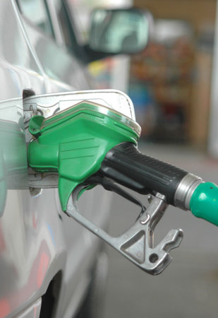 Refulling car tank on puming station