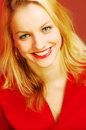 A young pretty smiling womanの写真素材