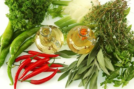 Different vinegars with miscellaneous herbsの写真素材