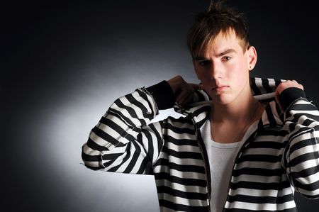 A guy in clothes with black and white stripesの写真素材