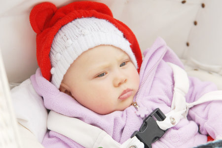 A baby in a pram