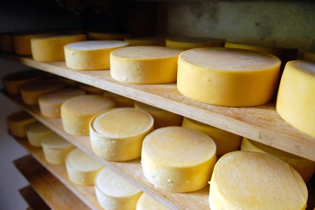 The chees in line in shelving in Nebaj.の写真素材