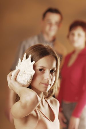 A girl with a shellの写真素材