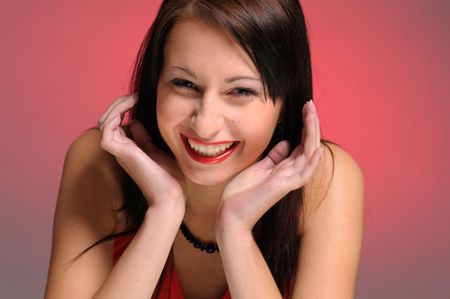The portrait of black-haired woman with red lipstickの写真素材