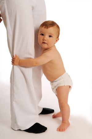 The little boy with toy on the white backgroundの写真素材