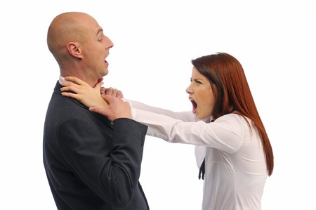 Woman strangles man on white backgroundの写真素材