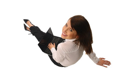 Woman seated, a manager with notebook on a white backgroundの写真素材