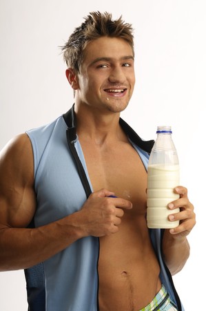 A man with bottle of milkの写真素材