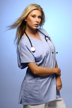 Blond nurse with stethoscope around her neck の写真素材